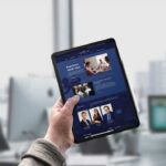 man-holding-ipad